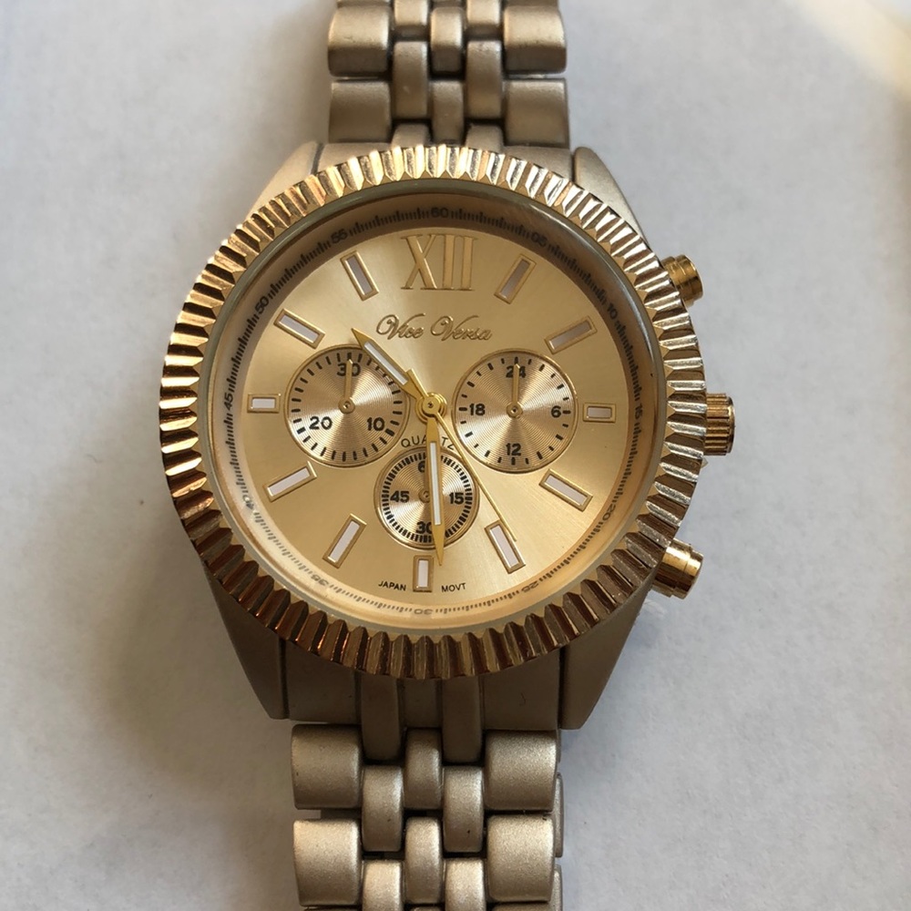 Vice versa gold tone watch